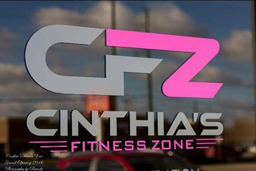 Signage on the store front of Cinthia's Fitness Studio designed by Shundra Harris Interiors