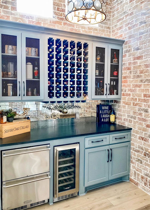 butlers pantry with antique aqua cabinets and wine rack